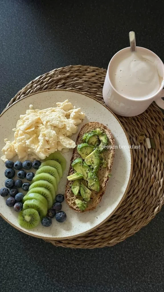 Healthy avocado toast with eggs served on a plate for breakfast.