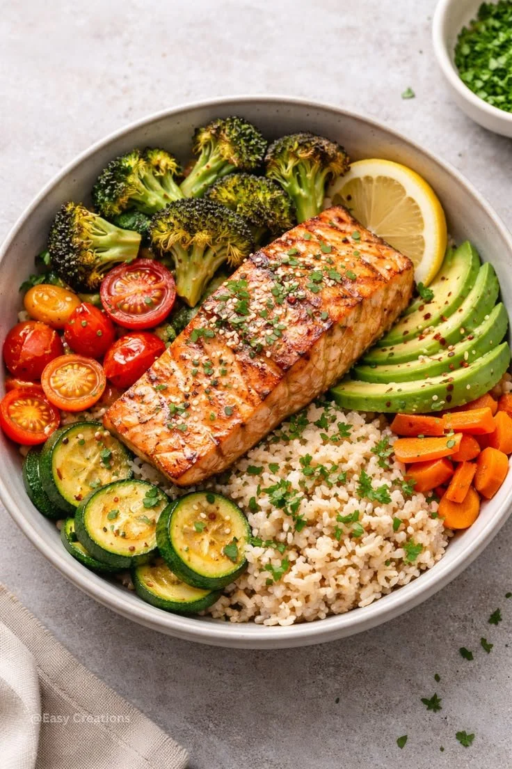 Quick and healthy salmon meal served with vegetables and herbs